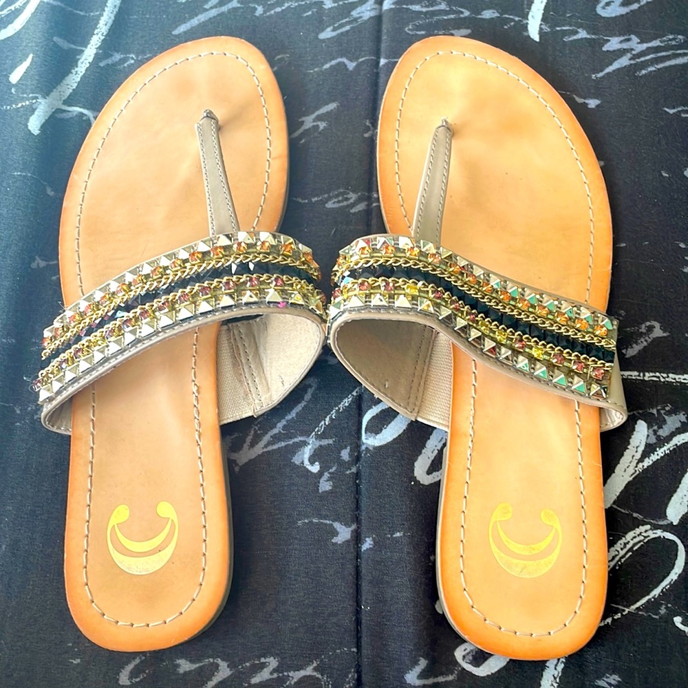 Bejeweled sandals.